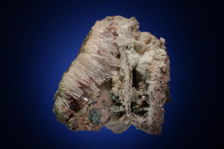 NATROLITE with PREHNITE, ANALCIME and COPPER in CALCITE